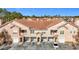 Aerial view of townhome exteriors showcasing garages and well-maintained community parking at 17996 Villa Creek Dr # 17996, Tampa, FL 33647