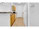 Efficient kitchen with ample counter space, white appliances, and wood-look floors at 17996 Villa Creek Dr # 17996, Tampa, FL 33647