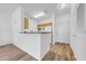 Cozy kitchen with breakfast bar, white appliances, and ample counter space at 17996 Villa Creek Dr # 17996, Tampa, FL 33647