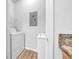 Efficient laundry room featuring a washer, dryer, overhead wire rack, and neutral walls at 17996 Villa Creek Dr # 17996, Tampa, FL 33647
