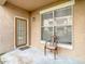 Cozy outdoor patio with chair, perfect for relaxing at 17996 Villa Creek Dr # 17996, Tampa, FL 33647