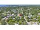 The home sits nestled among lush greenery, with a view of the bay in the distance at 1822 1St Se St, St Petersburg, FL 33705
