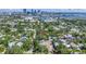 Aerial view of property in an urban setting near the water, surrounded by lush trees and mature landscaping at 1822 1St Se St, St Petersburg, FL 33705