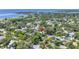 Aerial view of a neighborhood, featuring a quaint home with views of the bay in the distance at 1822 1St Se St, St Petersburg, FL 33705