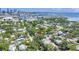 Aerial view showcases the home and the community with views of the downtown skyline at 1822 1St Se St, St Petersburg, FL 33705