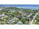 Aerial view shows the property surrounded by lush landscaping and neighborhood streets at 1822 1St Se St, St Petersburg, FL 33705