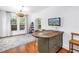 Charming dining room with hardwood floors, chandelier, and a large window with natural light at 1822 1St Se St, St Petersburg, FL 33705