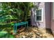 Charming home exterior with lush landscaping, adding character and curb appeal to the property at 1822 1St Se St, St Petersburg, FL 33705