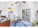 Bright breakfast nook with hardwood floors, granite countertops, and a door to the back porch at 1822 1St Se St, St Petersburg, FL 33705