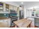 Functional kitchen features stainless steel appliances, wooden floors, and a central island at 1822 1St Se St, St Petersburg, FL 33705