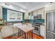 Well-equipped kitchen features granite countertops, stainless steel appliances, and ample cabinet space at 1822 1St Se St, St Petersburg, FL 33705
