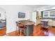 Bright open kitchen with island seating and television at 1822 1St Se St, St Petersburg, FL 33705