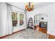 Bright living room featuring a patterned rug, chandelier and lots of natural light at 1822 1St Se St, St Petersburg, FL 33705