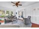 Bright living room with French doors, comfortable seating and hardwood floors at 1822 1St Se St, St Petersburg, FL 33705