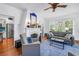 Bright living room boasts a fireplace, large windows, and stylish furnishings at 1822 1St Se St, St Petersburg, FL 33705
