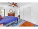 Spacious main bedroom with hardwood floors, dresser, and large closet at 1822 1St Se St, St Petersburg, FL 33705