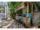 Inviting outdoor bar area with a unique design perfect for entertaining guests in a relaxed backyard setting at 1822 1St Se St, St Petersburg, FL 33705