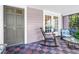 Inviting screened porch with checkered floors offers a peaceful outdoor space to unwind at 1822 1St Se St, St Petersburg, FL 33705