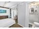 Bright studio apartment with a view to the backyard, bathroom, and murphy bed offering a cozy and efficient living space at 1822 1St Se St, St Petersburg, FL 33705