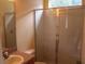 Bathroom featuring shower with glass doors and a sink at 1835 Fircrest Ct, Wesley Chapel, FL 33543