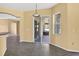 Dining area with sliding door access to the screened patio and kitchen views at 1835 Fircrest Ct, Wesley Chapel, FL 33543