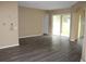 Spacious living room with sliding glass doors for natural light and outdoor access at 1835 Fircrest Ct, Wesley Chapel, FL 33543