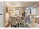 Cozy dining area featuring elegant table setting, decorative lighting and an adjacent kitchen at 18439 Bridle Club Dr # 18439, Tampa, FL 33647