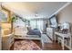 Comfortable main bedroom features wood flooring, calming decor, and bright natural light at 18439 Bridle Club Dr # 18439, Tampa, FL 33647
