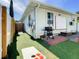 Backyard with projector screen, grill, and lawn games for outdoor fun at 1887 Springtime Ave, Clearwater, FL 33755