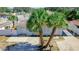 Well-maintained home with mature landscaping and a welcoming entrance at 1887 Springtime Ave, Clearwater, FL 33755
