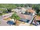 Charming home with palm trees and well-maintained landscaping at 1887 Springtime Ave, Clearwater, FL 33755