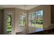 Eat in kitchen area with large windows providing lots of natural light and a view of the backyard at 19251 Stone Hedge Dr, Tampa, FL 33647