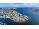 Wide aerial shot of the waterfront community showing the property's peninsular location at 2010 E Vina Del Mar Blvd, St Pete Beach, FL 33706