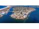 Waterfront community with stunning views of the bay and surrounding islands, offering a serene coastal lifestyle at 2010 E Vina Del Mar Blvd, St Pete Beach, FL 33706