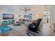 Cozy living room with comfortable seating, modern decor, and a large television at 2010 E Vina Del Mar Blvd, St Pete Beach, FL 33706