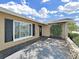 Beautiful single-story home with dark shutters and a stone accent wall at 2209 Kingswood Ln, Brandon, FL 33511
