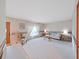 Inviting living room featuring soft lighting, carpet floors, and stylish floral wallpaper at 2209 Kingswood Ln, Brandon, FL 33511