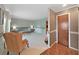Spacious living room with large window and neutral color palette at 2209 Kingswood Ln, Brandon, FL 33511