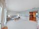 Bright living room with view of the kitchen at 2209 Kingswood Ln, Brandon, FL 33511