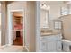 Bathroom with a single vanity with white cabinets at 2221 Platinum Dr, Sun City Center, FL 33573