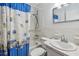 Bathroom featuring a sink, toilet, bathtub, and shower at 2310 Denmark St # 34, Clearwater, FL 33763