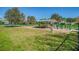 Dog park featuring covered seating area, shade trees, and green space for pets to play at 2310 Denmark St # 34, Clearwater, FL 33763