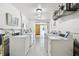 Clean and functional laundry room with multiple washers for resident's convenience at 2310 Denmark St # 34, Clearwater, FL 33763