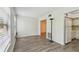 A living room with wood grain flooring and a large window to provide natural light at 2310 Denmark St # 34, Clearwater, FL 33763