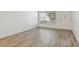 Bright living room showcasing neutral walls and gray-tone flooring that enhances the room's spaciousness at 2310 Denmark St # 34, Clearwater, FL 33763