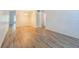 Spacious living area with neutral walls, modern flooring, and an open layout to other rooms in the home at 2310 Denmark St # 34, Clearwater, FL 33763