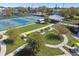 Aerial view of the community pickleball courts, park, and picnic area at 2310 Denmark St # 34, Clearwater, FL 33763