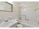 Bright bathroom with a sink, toilet, bathtub, and shower features at 2311 Brisbane St # 45, Clearwater, FL 33763