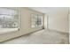 A bright bedroom with two large windows and a spacious closet at 2311 Brisbane St # 45, Clearwater, FL 33763