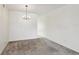 Dining room features a chandelier and neutral paint at 2311 Brisbane St # 45, Clearwater, FL 33763
